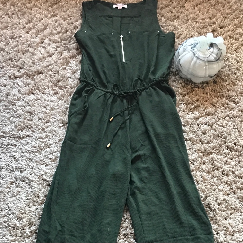 Green jumpsuit.